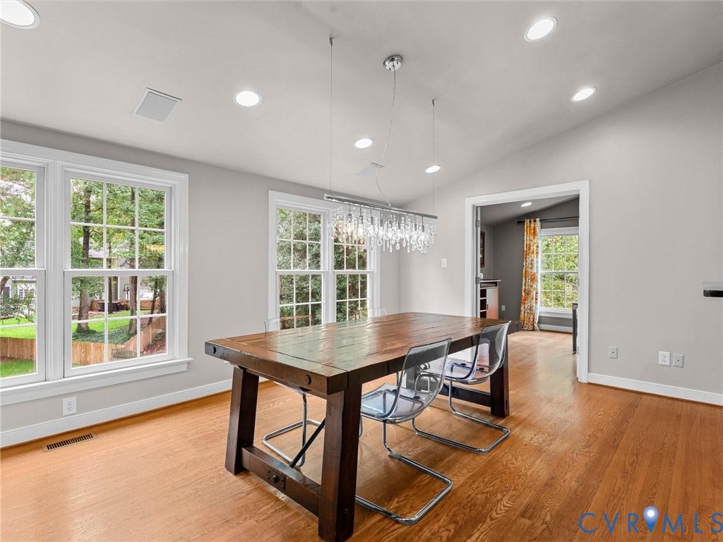 12100 English Ivy Lane, Glen Allen, VA 23059 Wood-finish flooring, vaulted ceilings, multi-pane windows, and crystal chandelier fixture
