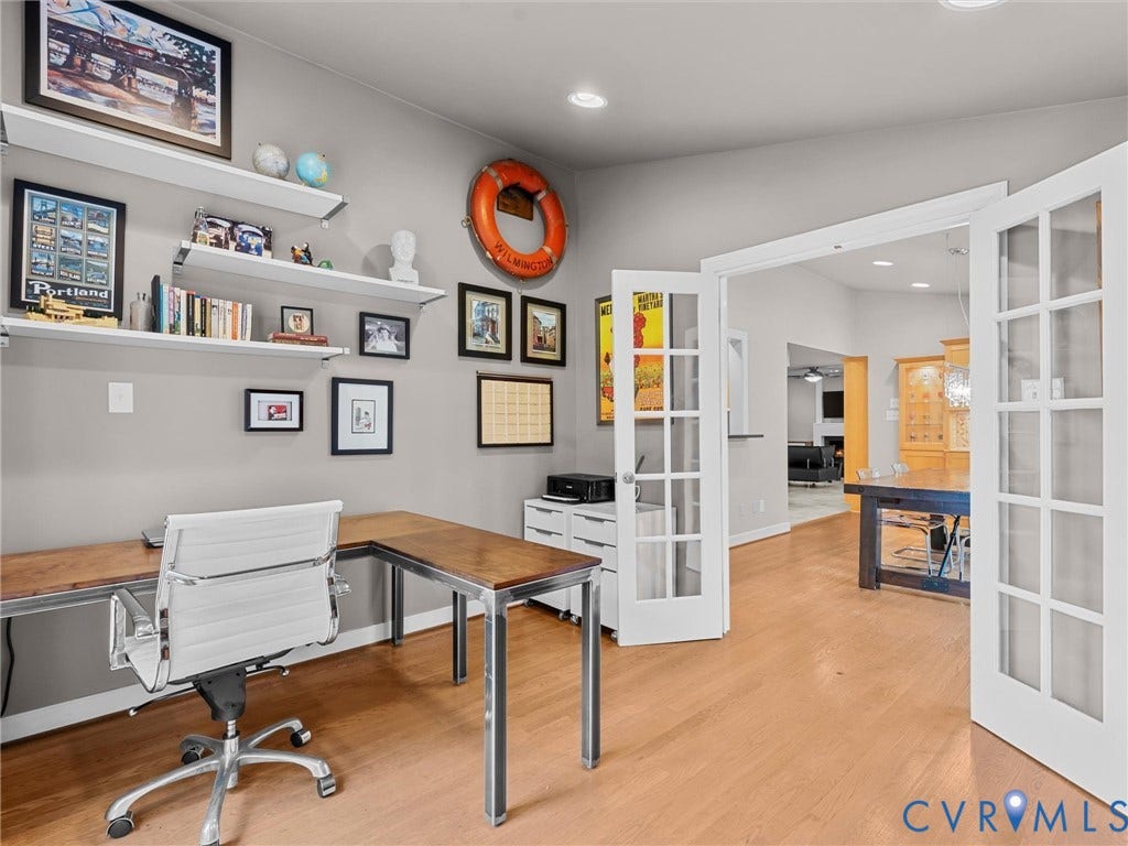 12100 English Ivy Lane, Glen Allen, VA 23059 Room featuring wood-finish flooring, recessed lighting, white built-in wall shelving, and dual white-framed French doors