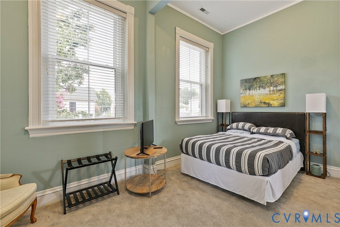2021 North Avenue, Richmond, VA 23222 High ceilings and crown molding enhance the room's spacious feel