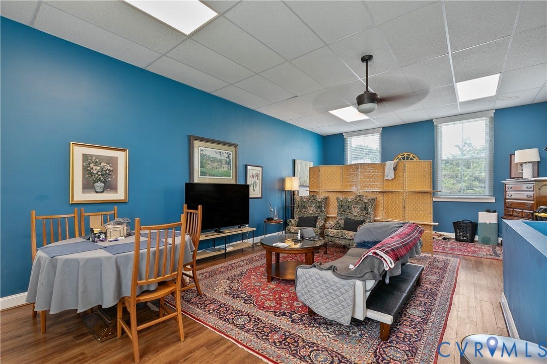 2021 North Avenue, Richmond, VA 23222 Recessed lighting fixtures, wood-finish flooring, two large windows, and a ceiling fan