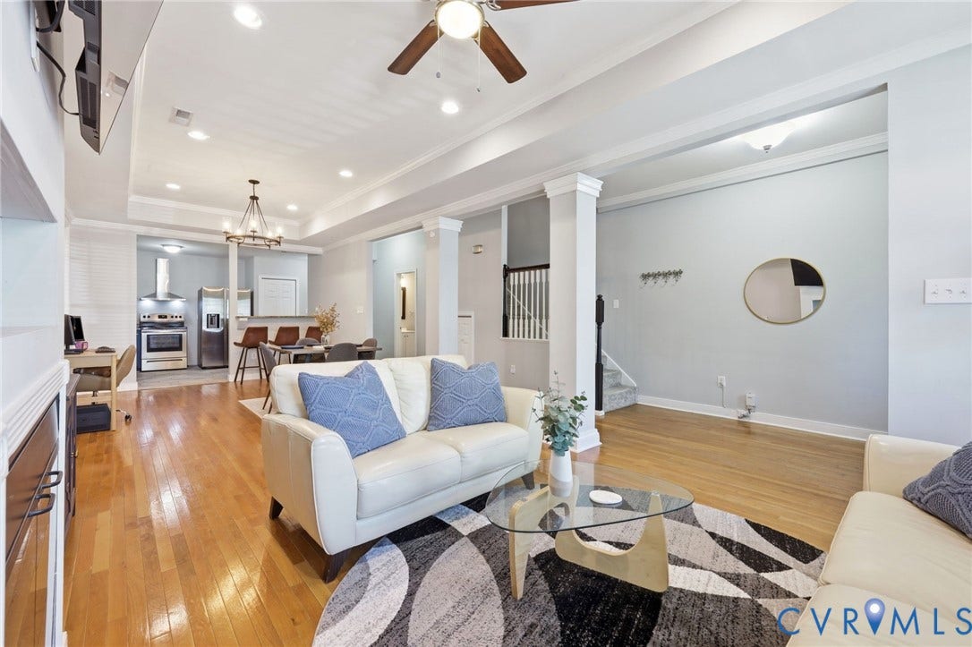 3015 M Street, Church Hill, Richmond, VA 23223 Hardwood flooring, recessed lighting, ceiling fan, decorative columns, and a kitchen with stainless steel appliances