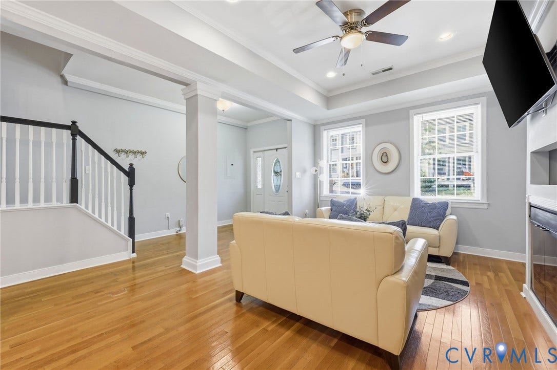 3015 M Street, Church Hill, Richmond, VA 23223 Hardwood flooring, recessed lighting, white trim, a ceiling fan, and a built-in fireplace