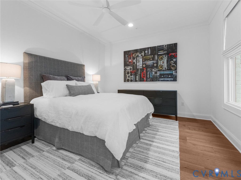 511 Libbie Avenue, #A, The Row At Westhampton, Richmond, VA 23226 Recessed ceiling lighting, wood-finish flooring, white window trim, and a ceiling fan