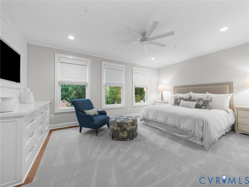 511 Libbie Avenue, #A, The Row At Westhampton, Richmond, VA 23226 Recessed lighting, crown molding, ceiling fan, white trim, and multiple windows