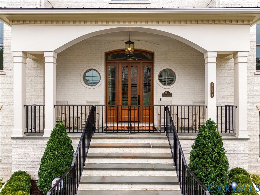511 Libbie Avenue, #A, The Row At Westhampton, Richmond, VA 23226 White brick exterior with an arched entryway