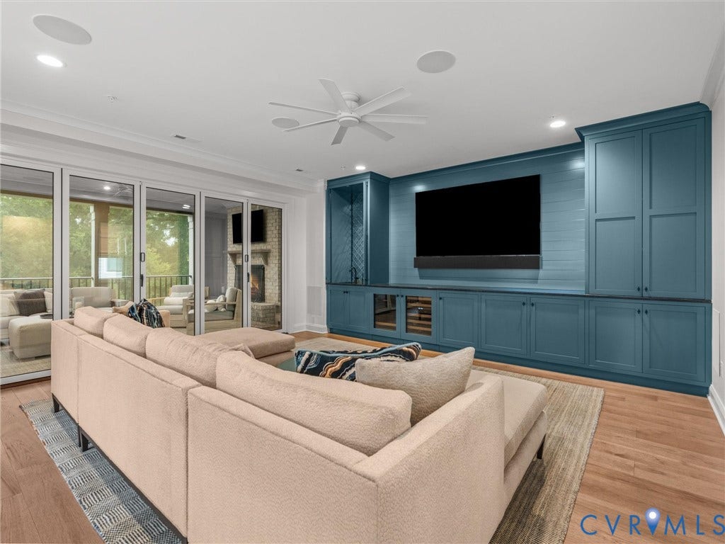 511 Libbie Avenue, #A, The Row At Westhampton, Richmond, VA 23226 Built-in cabinetry with integrated wine refrigeration, wood-finish flooring, recessed lighting, and a ceiling fan