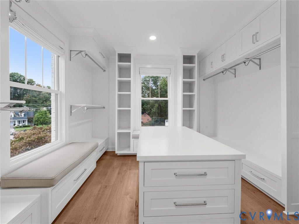 511 Libbie Avenue, #A, The Row At Westhampton, Richmond, VA 23226 Built-in storage solutions with shelving, white cabinetry, and hanging rods