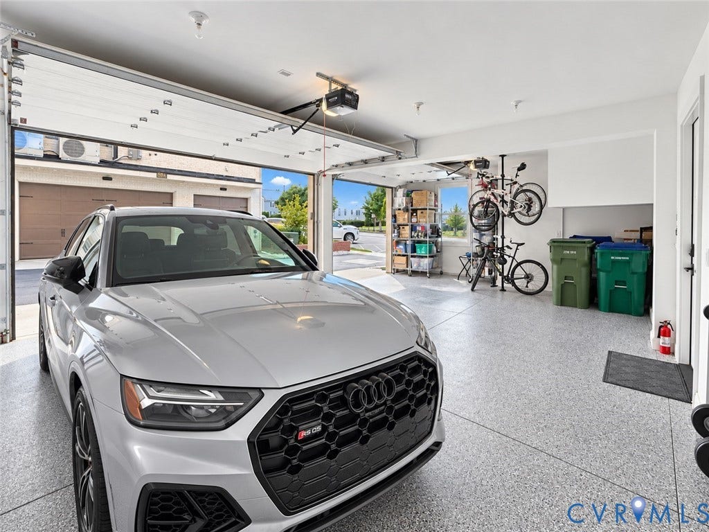 511 Libbie Avenue, #A, The Row At Westhampton, Richmond, VA 23226 Attached garage with a sectional overhead door and epoxy flooring