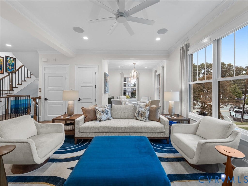 511 Libbie Avenue, #A, The Row At Westhampton, Richmond, VA 23226 High ceilings with recessed lighting, large windows, ceiling fan, wood-finish flooring, and a visible staircase with dark wood handrails