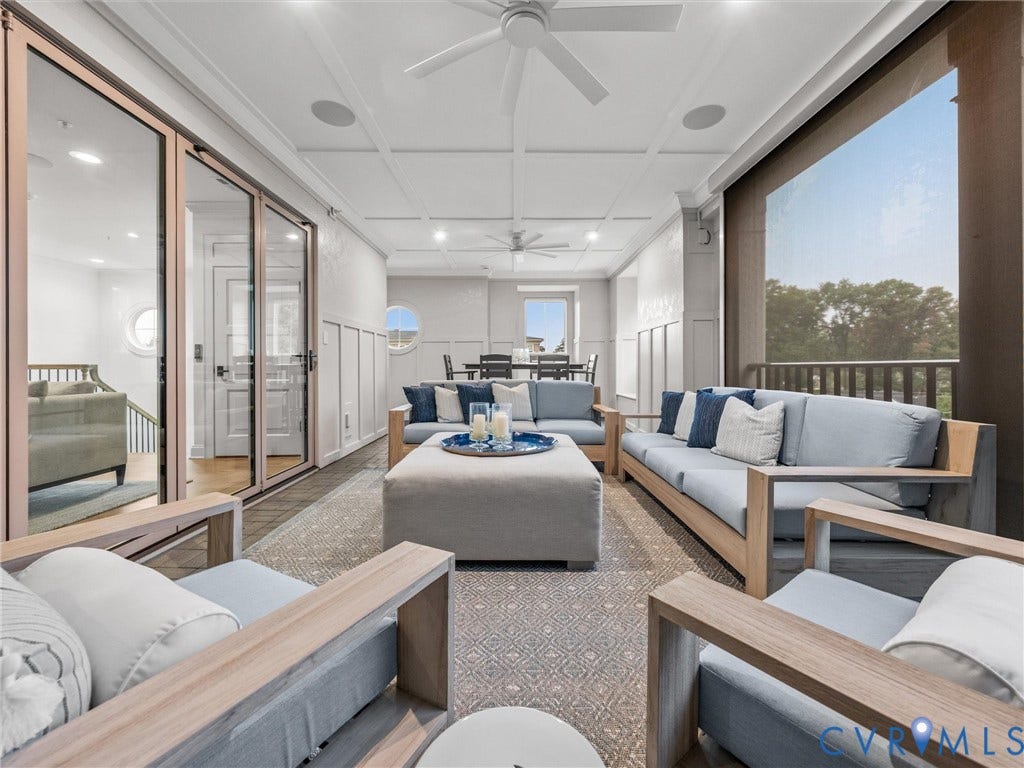 511 Libbie Avenue, #A, The Row At Westhampton, Richmond, VA 23226 Covered outdoor patio with a coffered ceiling, multiple ceiling fans, recessed lighting, and integrated audio speakers