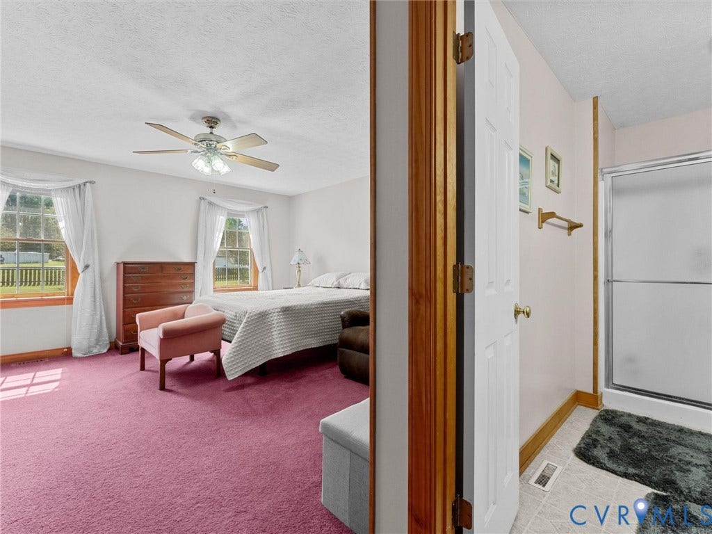 5325 Swift Hill Lane, Scandia Lake, Sandston, VA 23150 Wall-to-wall carpeting and a ceiling fan with integrated lighting