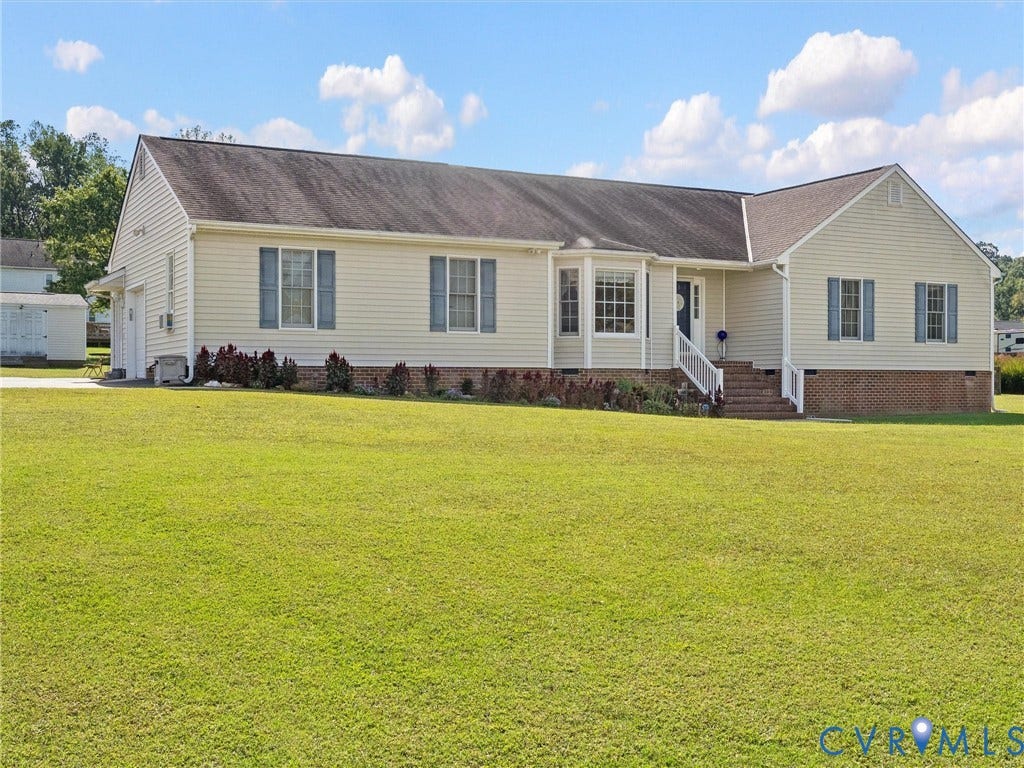 5325 Swift Hill Lane, Scandia Lake, Sandston, VA 23150 Ranch-style exterior with light-colored siding and a brick foundation