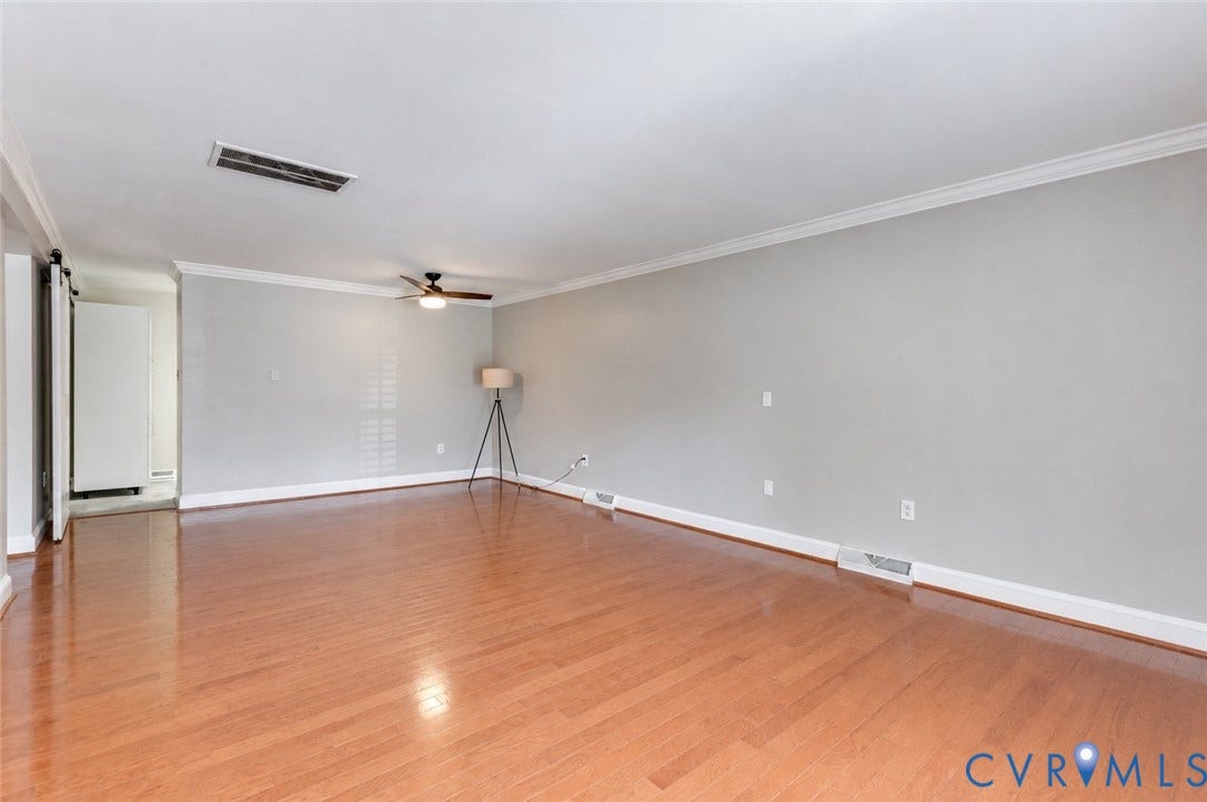 6 Stillwater Lane, Henrico, VA 23228 Hardwood-style flooring, light gray walls, crown molding, ceiling fan, and sliding barn doors