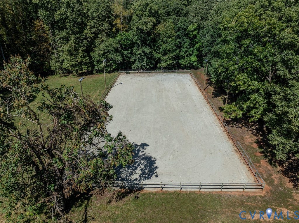 3120 McQuinn Road, Powhatan, VA 23139 Expansive 200X90 outdoor arena with wood fencing, and perimeter lighting