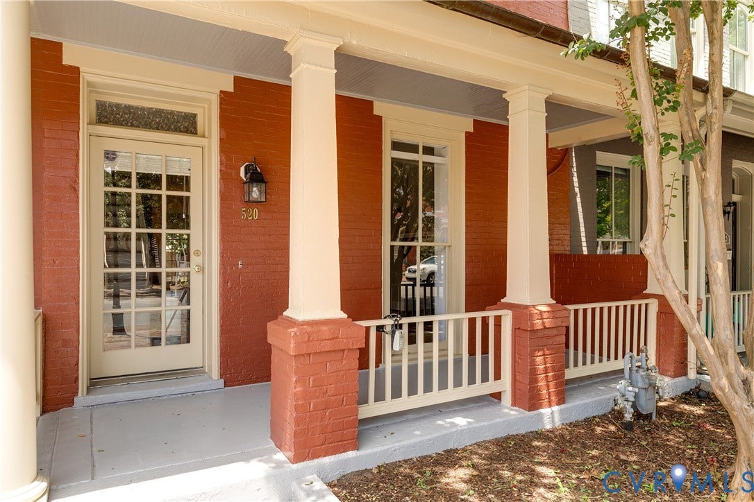 520 N 1st Street, Richmond, VA 23219 Brick facade with a covered porch featuring white columns
