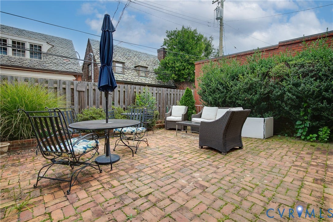 2606 Park Avenue, #U6, The Fan, Richmond, VA 23220 Expansive brick paver patio featuring mature perimeter plantings and a privacy fence