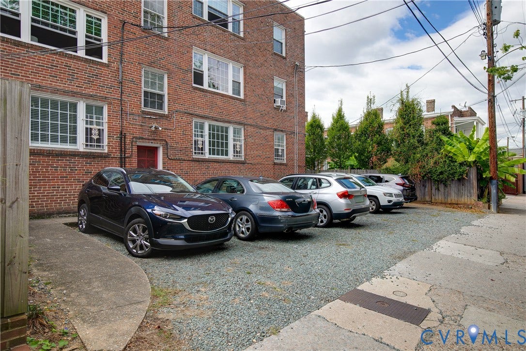 2606 Park Avenue, #U6, The Fan, Richmond, VA 23220 Brick exterior with multiple windows and a red entry door