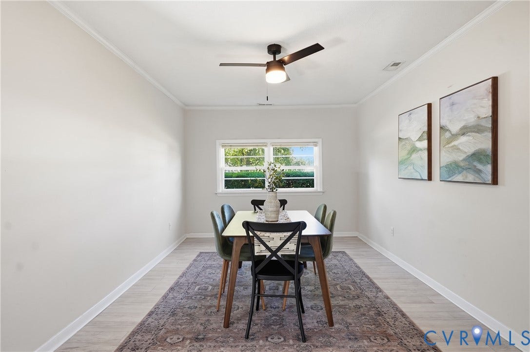 Recessed lighting, crown molding, wood-finish flooring, ceiling fan with integrated light, and natural light from a window