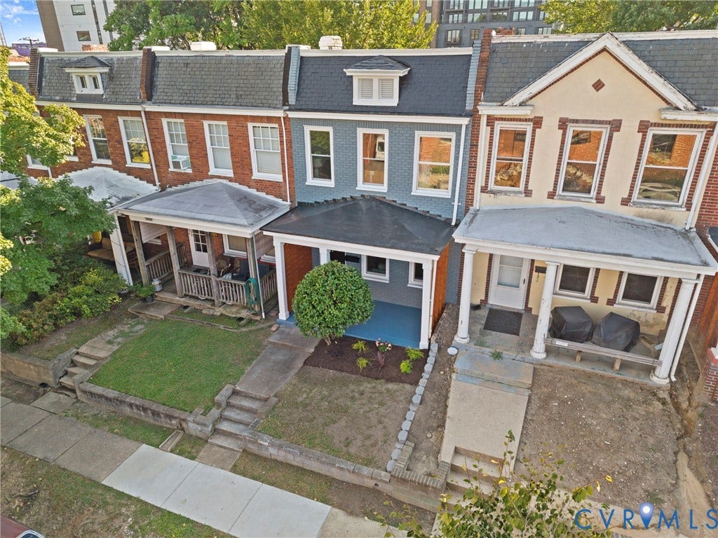 2931 W Leigh Street, Scotts Addition, Richmond, VA 23230 Brick exterior with gabled dormers and a covered front porch