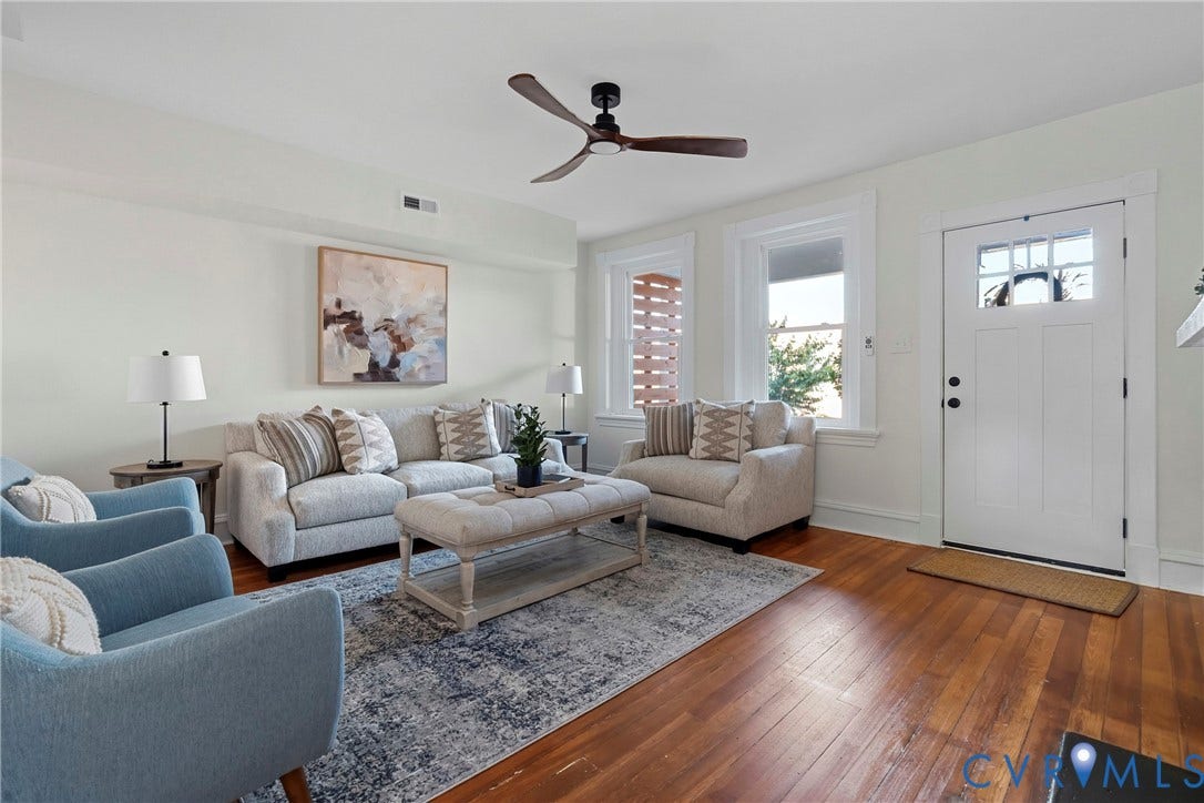 2931 W Leigh Street, Scotts Addition, Richmond, VA 23230 Hardwood flooring, white trim, white walls, ceiling fan, and an entry door with glass panels