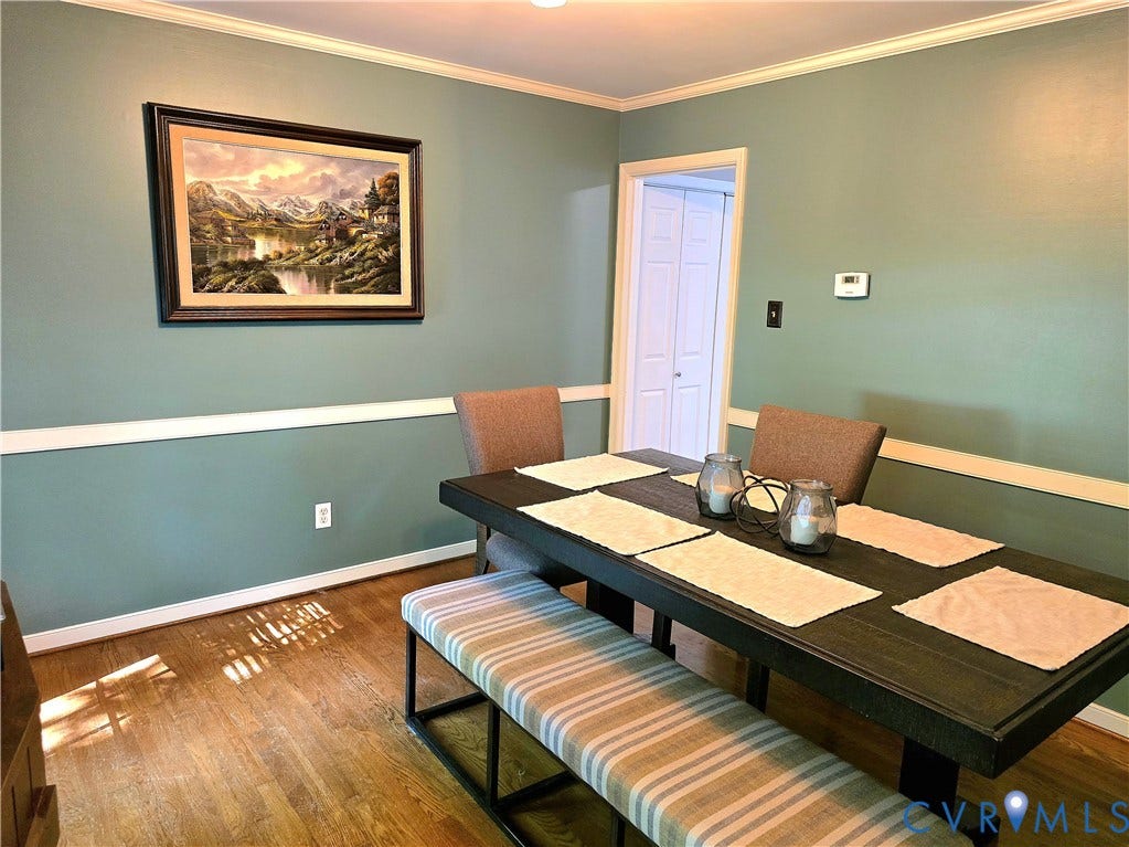 4207 Brixton Road, Creekwood, Chesterfield, VA 23832 Wood-finish flooring, crown molding, chair rail molding, and a white door