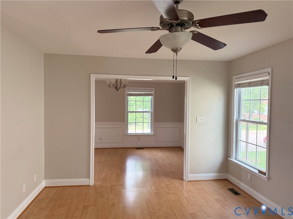 1709 Kemper Street, Richmond, VA 23220 Hardwood flooring throughout, neutral paint palette, ceiling fan with integrated lighting, and multiple windows with blinds