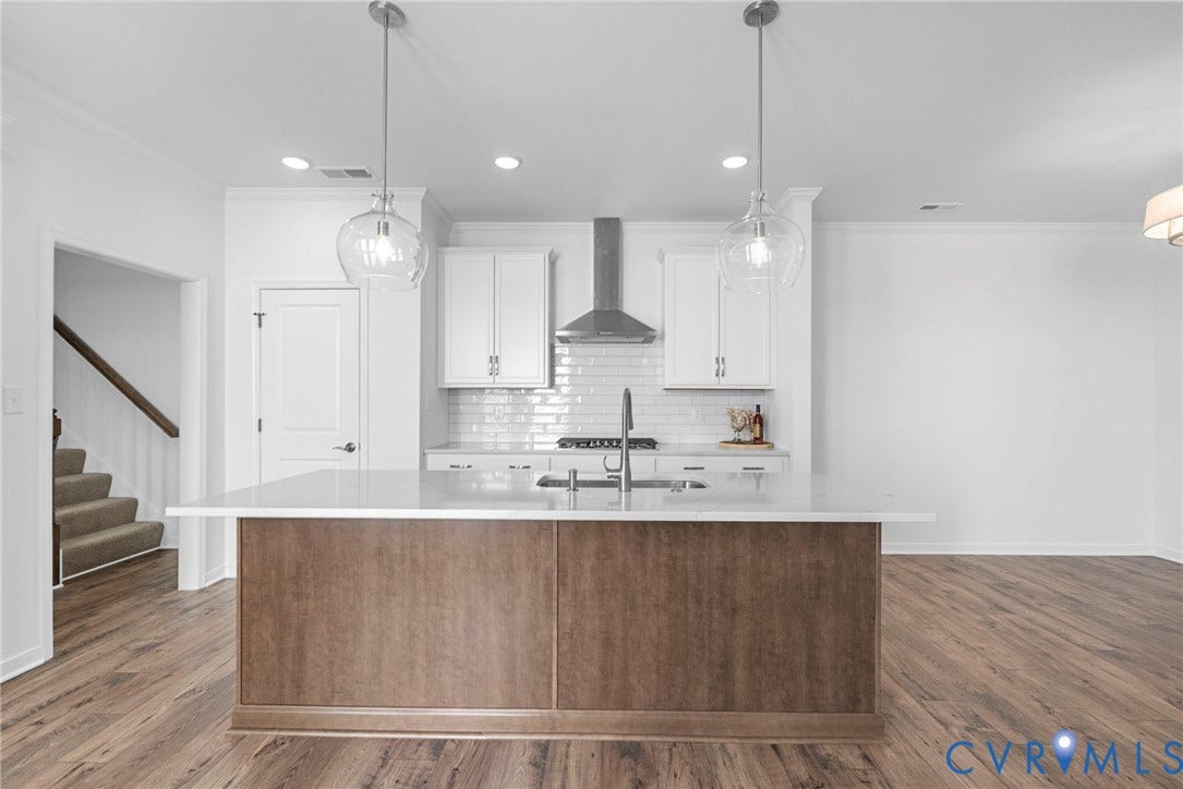 6726 Mayland Ridge Lane, The Villas At Swift Creek, Moseley, VA 23120 Quartz countertops, Tile backsplash, GE appliances