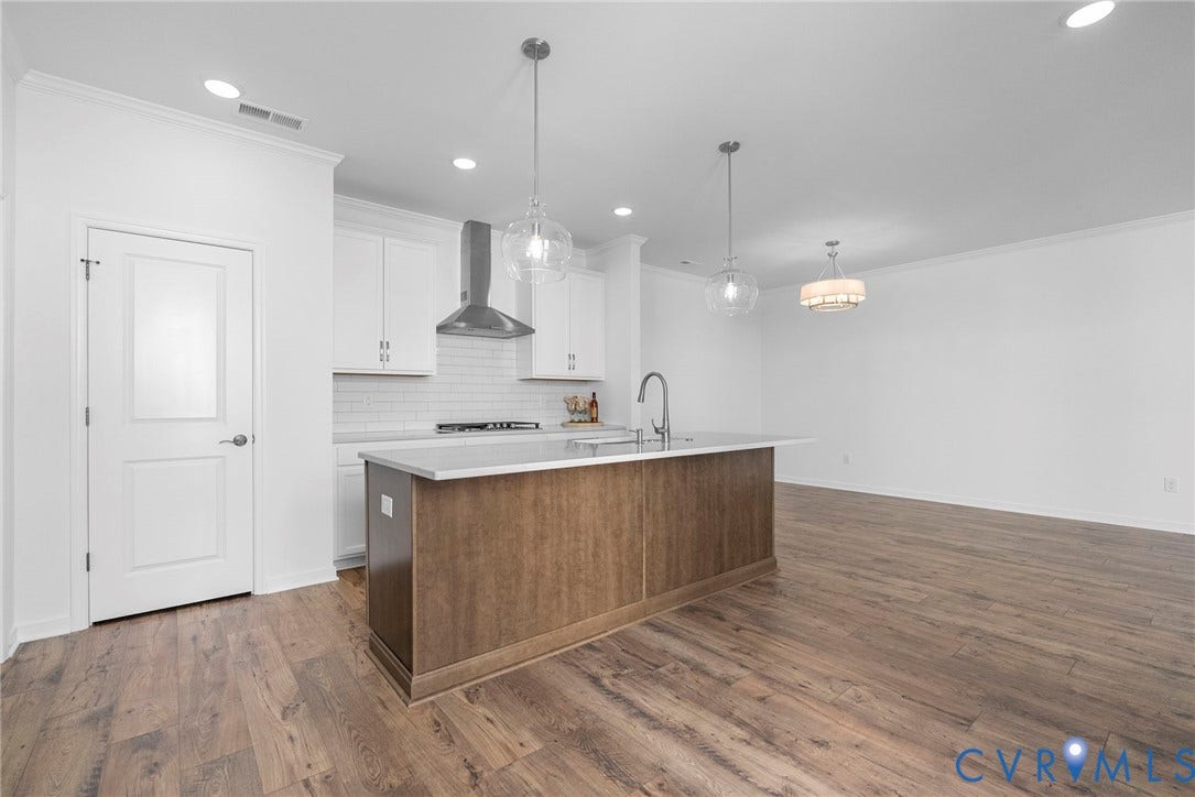 6726 Mayland Ridge Lane, The Villas At Swift Creek, Moseley, VA 23120 Quartz countertops, Tile backsplash, GE appliances