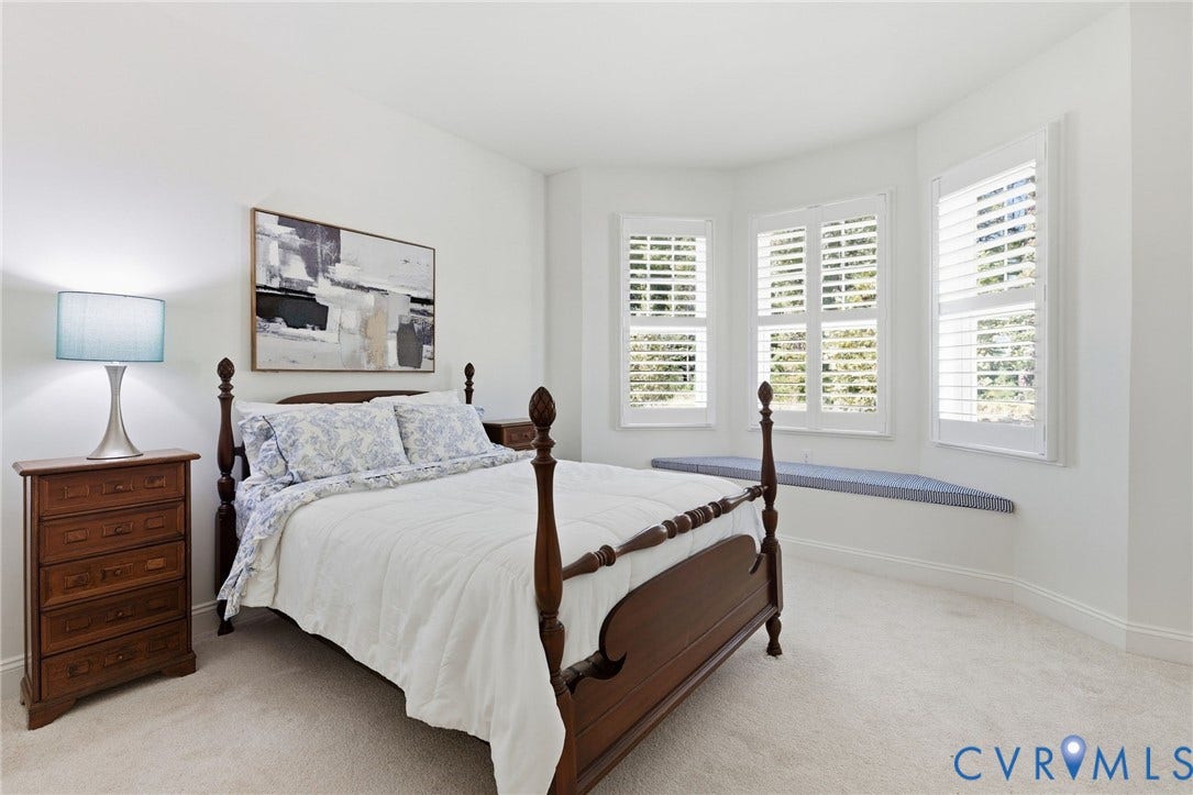 15750 Mosaic Creek Boulevard, Henrico, VA 23238 Second bedroom with bay window with plantation shutters and window seat