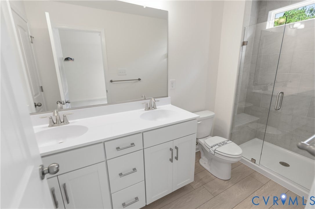 This photo shows a similar floorplan and quality level to Eastwood Homes. Actual design selections and layout may vary.