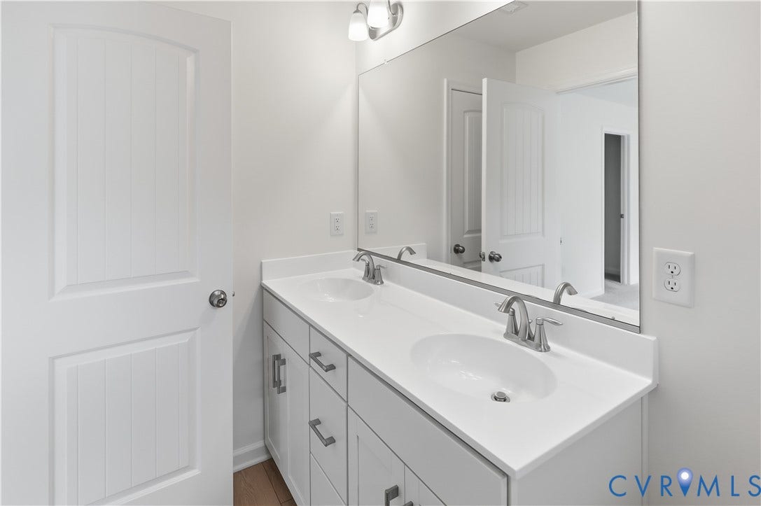 This photo shows a similar floorplan and quality level to Eastwood Homes. Actual design selections and layout may vary.