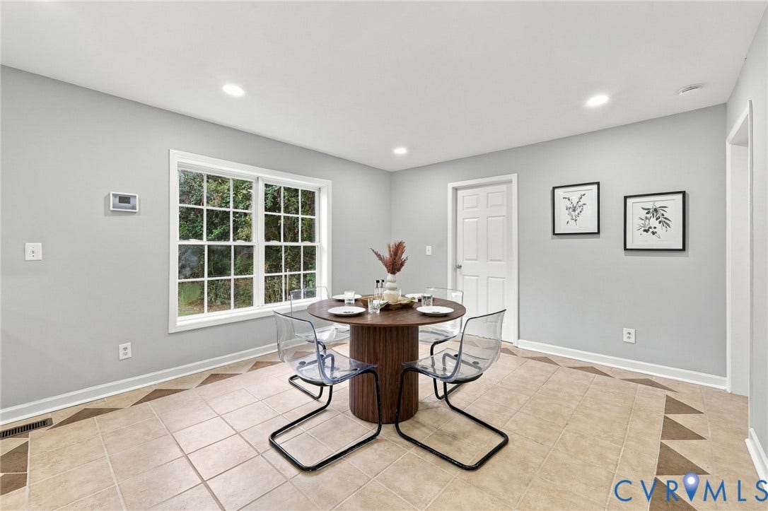 6409 Walmsley Boulevard, Chesterfield, VA 23224 Neutral-toned walls featuring recessed lighting, a multi-pane window, and decorative tile flooring with patterned geometric borders