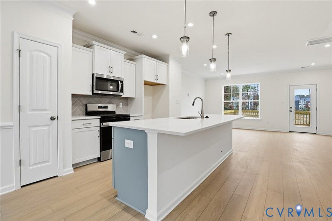 This photo shows a similar floorplan and quality level to Eastwood Homes. Actual design selections and layout may vary.
