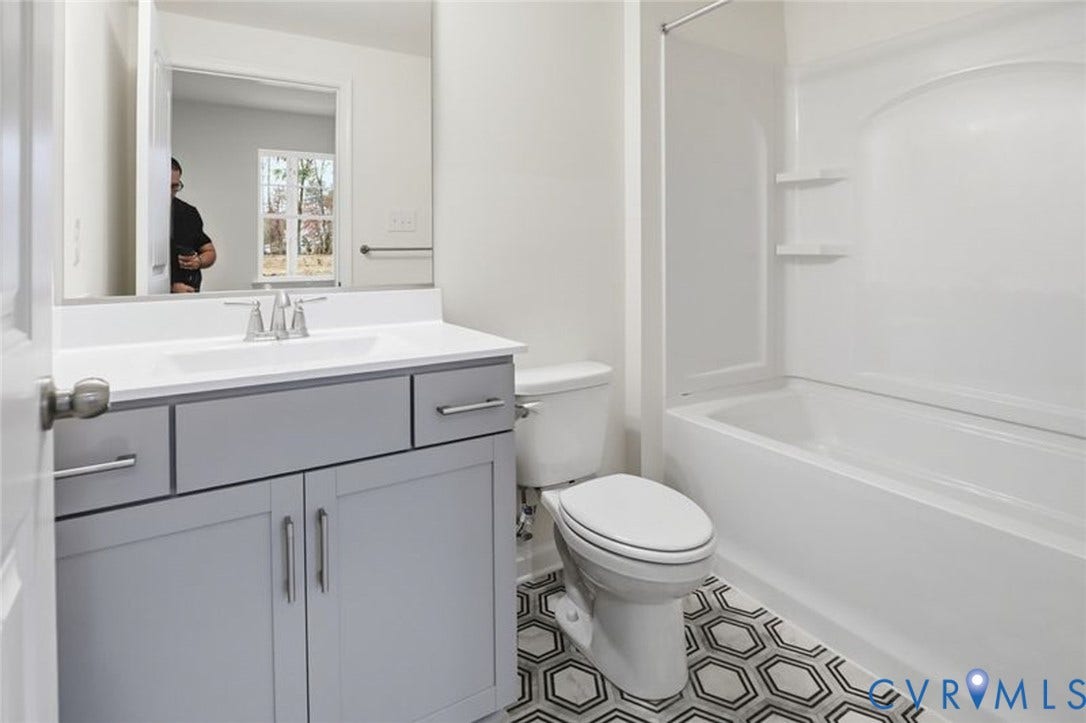 This photo shows a similar floorplan and quality level to Eastwood Homes. Actual design selections and layout may vary.