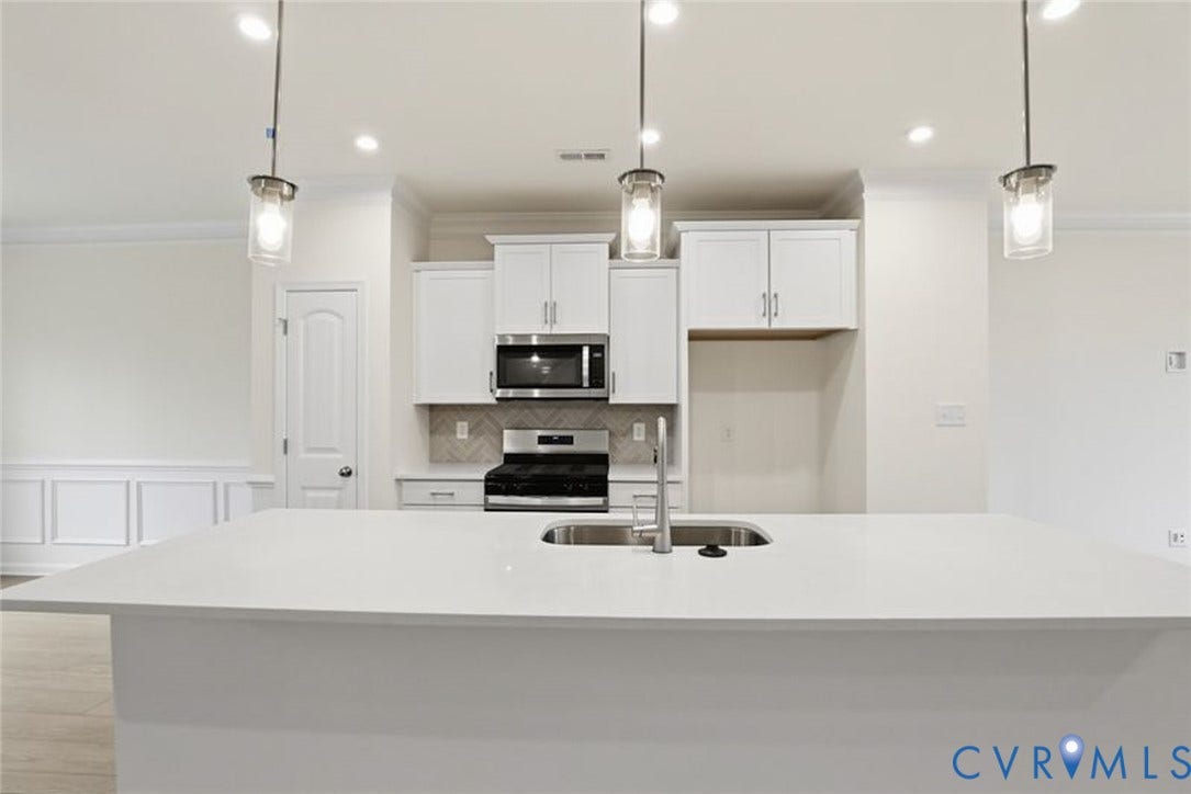 This photo shows a similar floorplan and quality level to Eastwood Homes. Actual design selections and layout may vary.