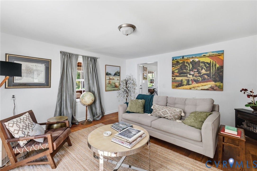 Hardwood flooring, recessed lighting, and a white ceiling finish.