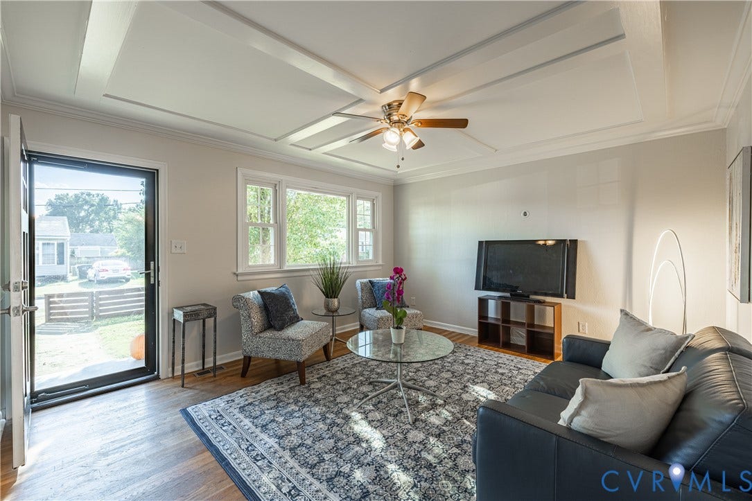 5312 Marian Street, Richmond, VA 23226 Living area featuring hardwood flooring, white coffered ceiling, multiple windows, and a ceiling fan