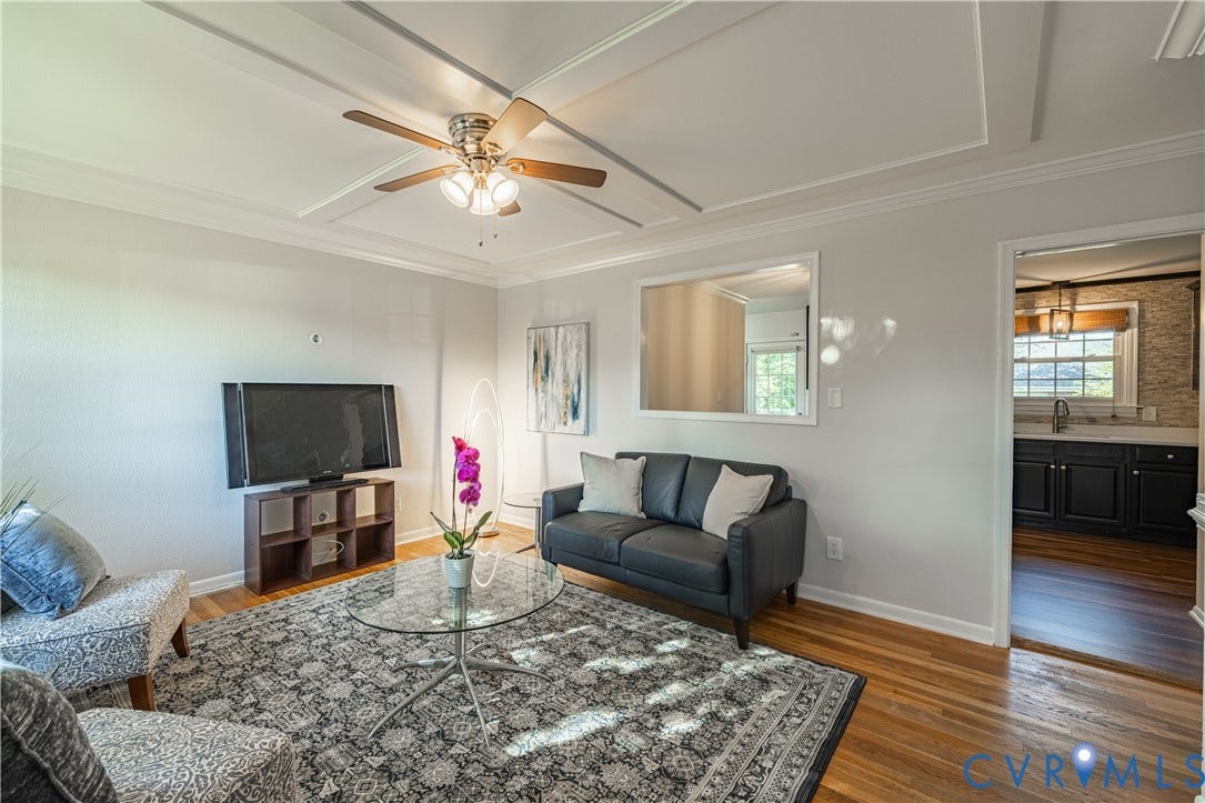5312 Marian Street, Richmond, VA 23226 Tray ceiling with crown molding and a ceiling fan