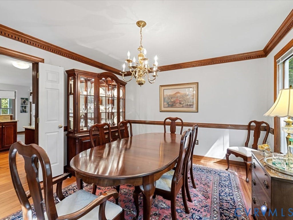 2993 Johnsonway Terrace, Powhatan, VA 23139 Formal dining room features crown and chair rail, and heart pine flooring.