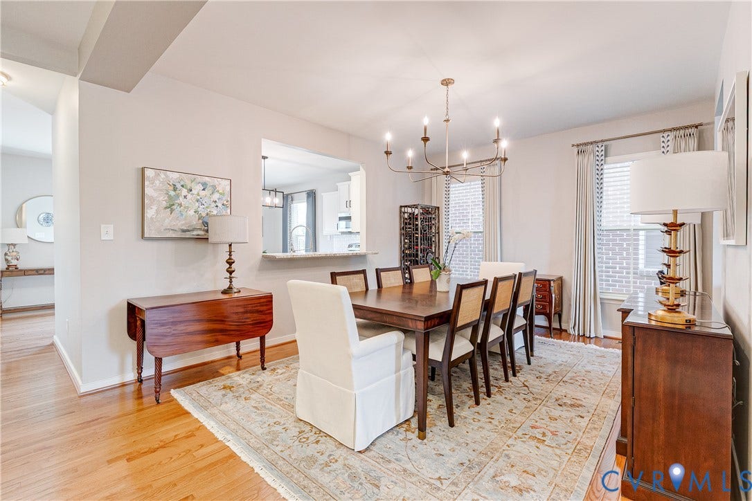1733 W Cary Street, Richmond, VA 23220 Hardwood flooring throughout, a pass-through to the kitchen featuring a granite countertop