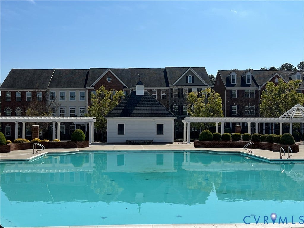3931 Liesfeld Place, West Broad Village, Henrico, VA 23060 Outdoor swimming pool with integrated steps, surrounding pergola structures, and a white cabana building