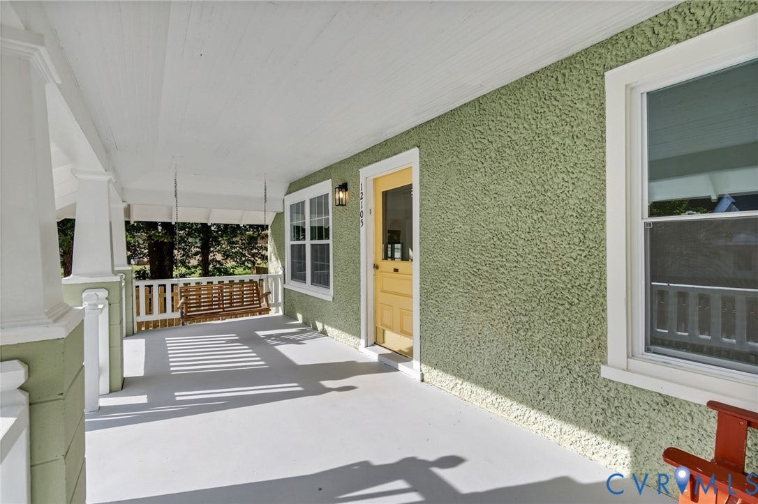 12105 Mathenay Drive, Mathenay, Chesterfield, VA 23831 Covered front porch featuring a textured exterior, white trim, and a porch swing