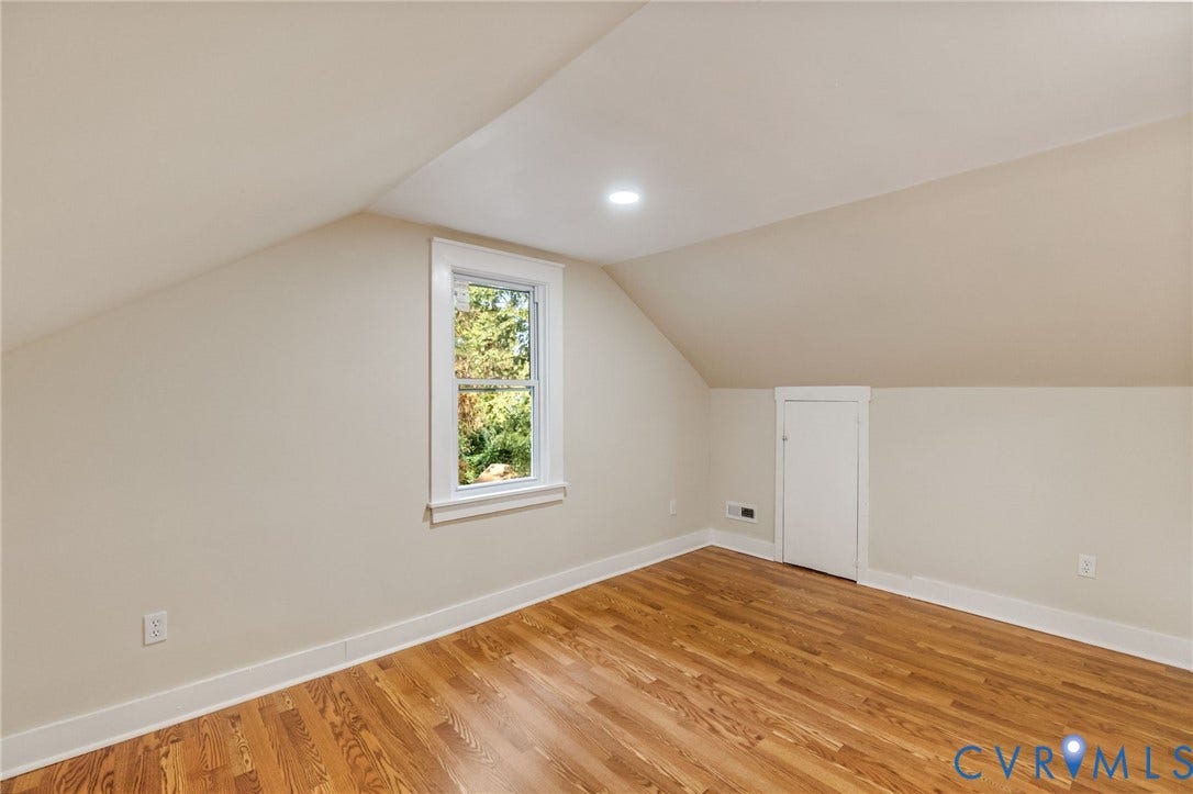 12105 Mathenay Drive, Mathenay, Chesterfield, VA 23831 Hardwood flooring, recessed lighting, sloped ceilings, single window with white trim, and a built-in storage door
