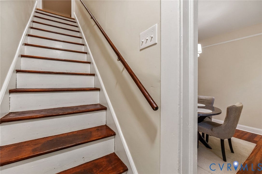 12105 Mathenay Drive, Mathenay, Chesterfield, VA 23831 Staircase featuring wood-finish treads and white risers with a coordinating wood handrail