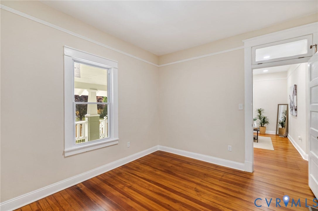 12105 Mathenay Drive, Mathenay, Chesterfield, VA 23831 Hardwood flooring, painted walls, window with trim, crown molding, and a doorway
