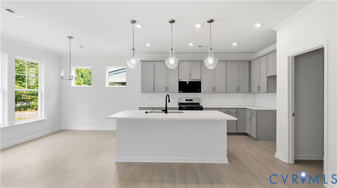 This home is UNDER CONSTRUCTION. The photo represents the plan, not the actual home. Design selections have been made.
