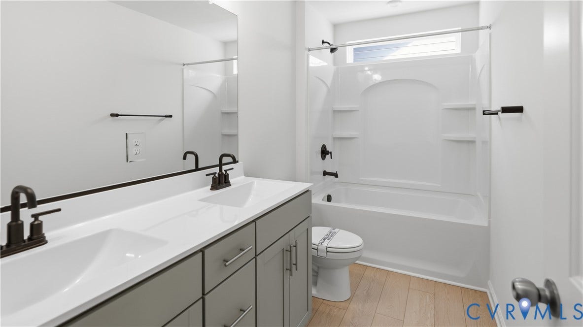 This home is UNDER CONSTRUCTION. The photo represents the plan, not the actual home. Design selections have been made.