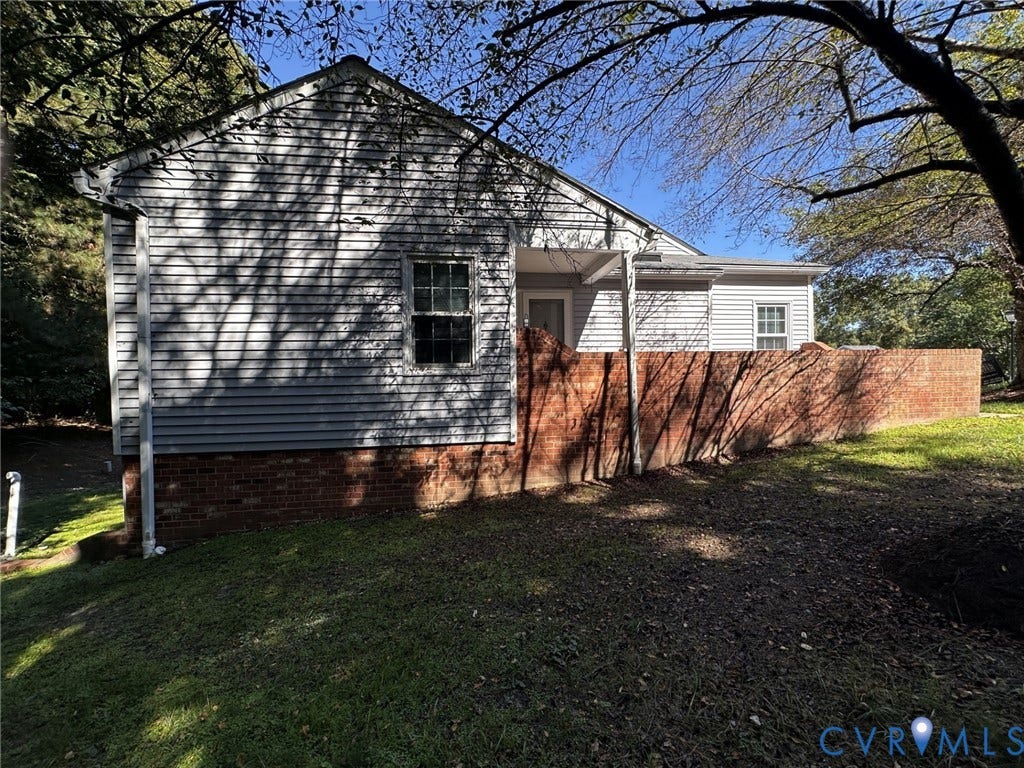 Exterior siding with brick foundation