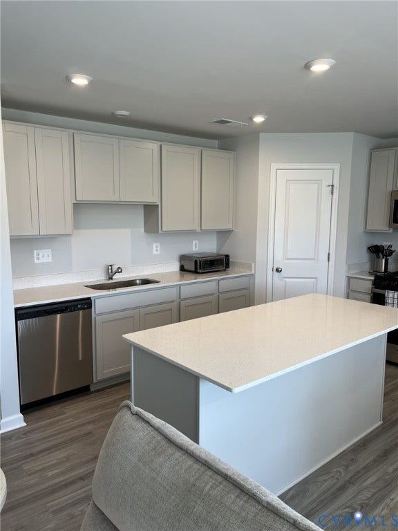 321 Camerons Ferry Drive, Glen Allen, VA 23060 Kitchen featuring a central island, light-toned cabinetry, stainless steel dishwasher, an undermount sink, and wood-finish flooring
