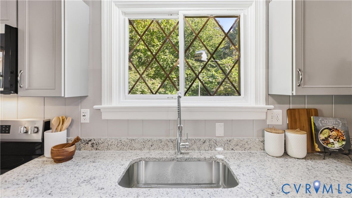 Stainless steel undermount sink with a gooseneck faucet
